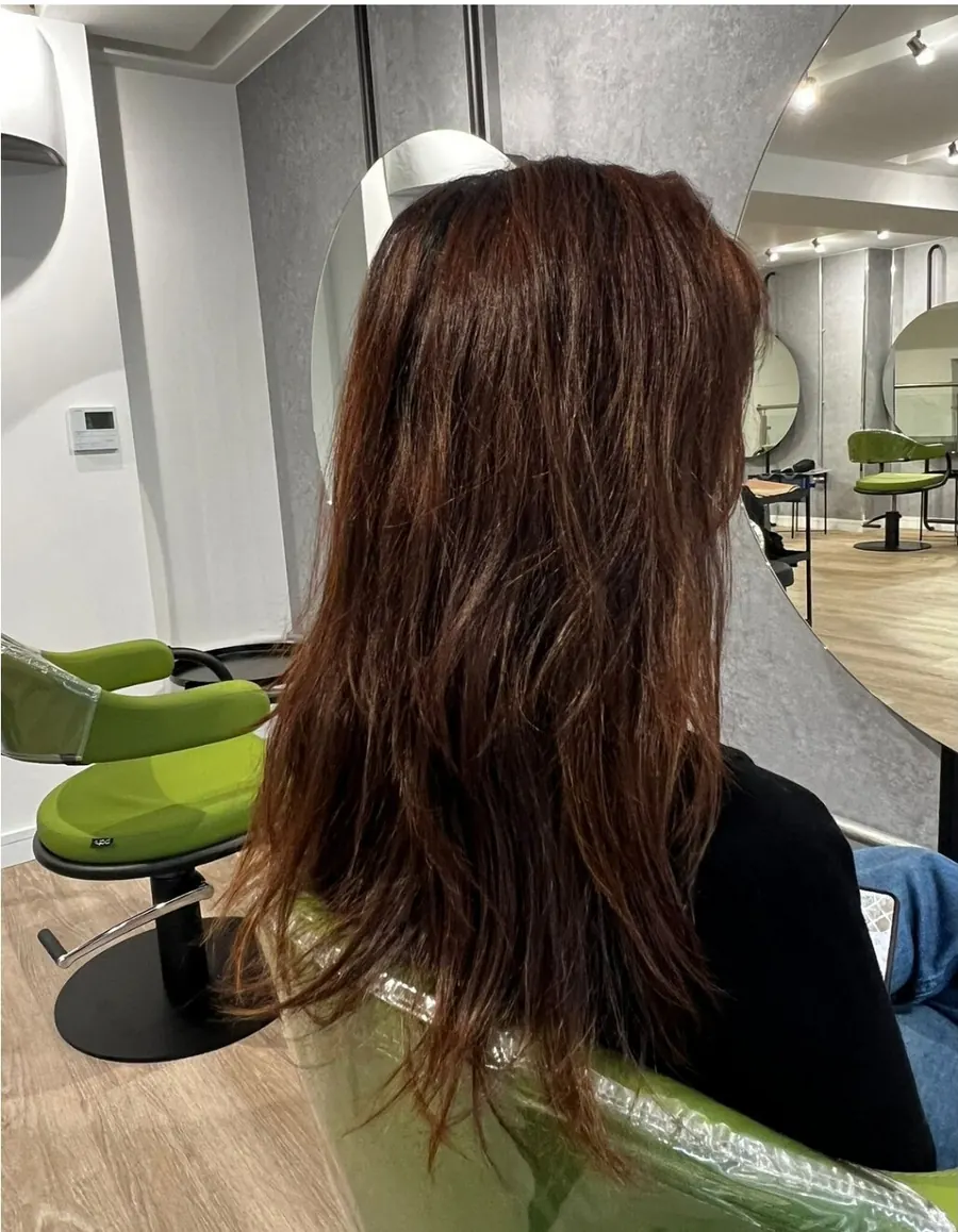 Long brown hair viewed from behind in the Haku Blackrock salon